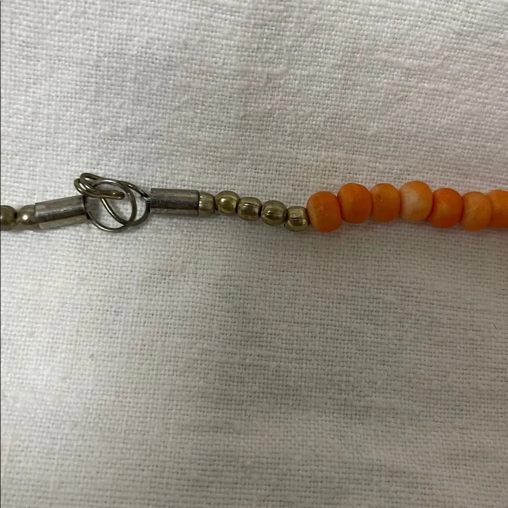 Vintage Orange Beaded Necklace with Gold Accents 14” long.
